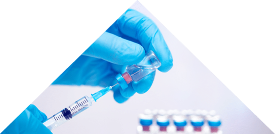 Scientist hand in blue gloves holding coronavirus, covid-19 vaccine disease, preparing for human clinical trials vaccination shot  Medicine and drug concept   